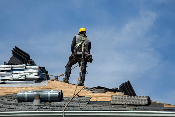 Professional Roof Replacement technician working in Chickasaw, OH